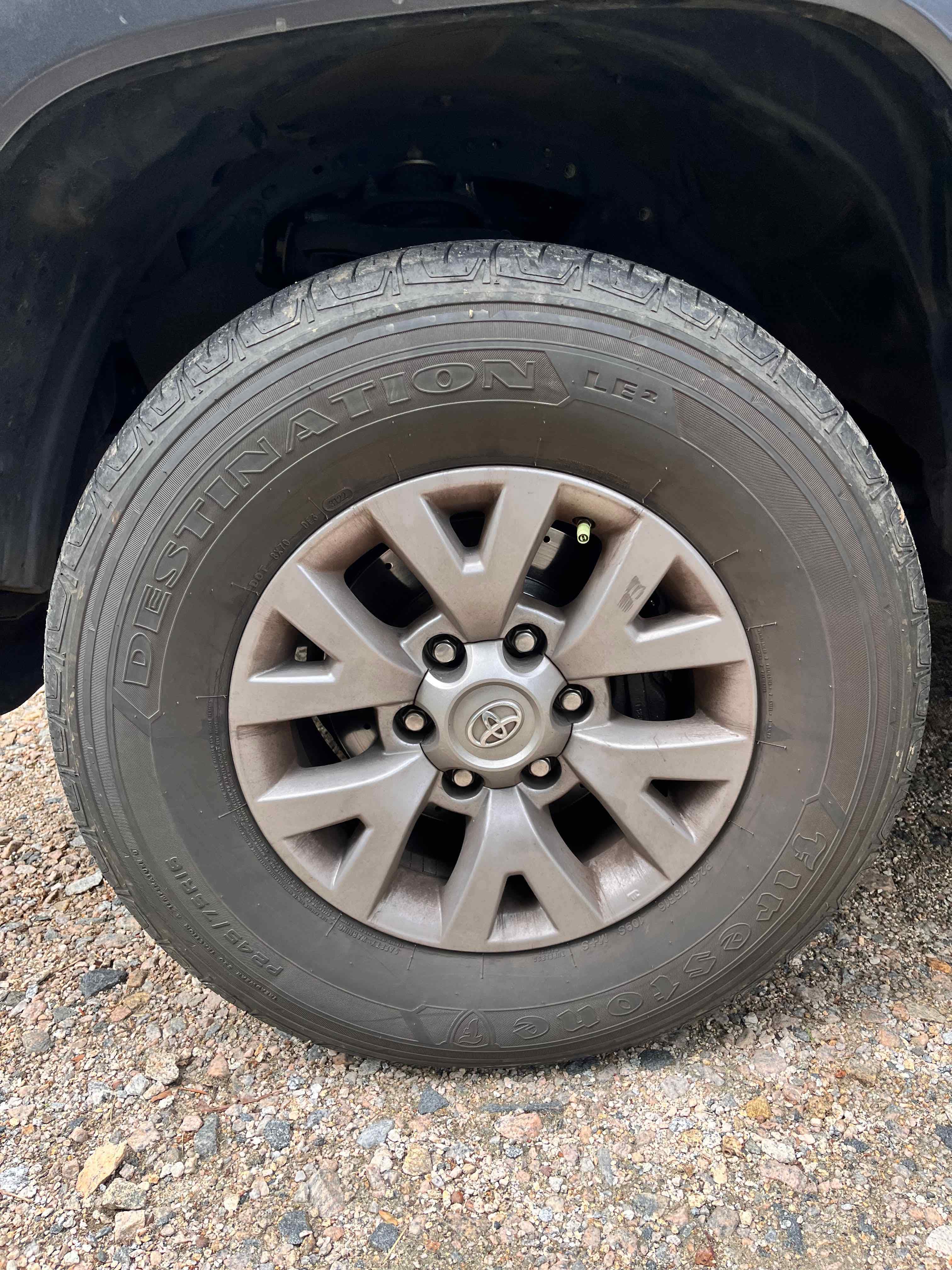 Vehicle tire and wheel with visible dirt